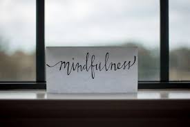 Mindfulness sign in a window